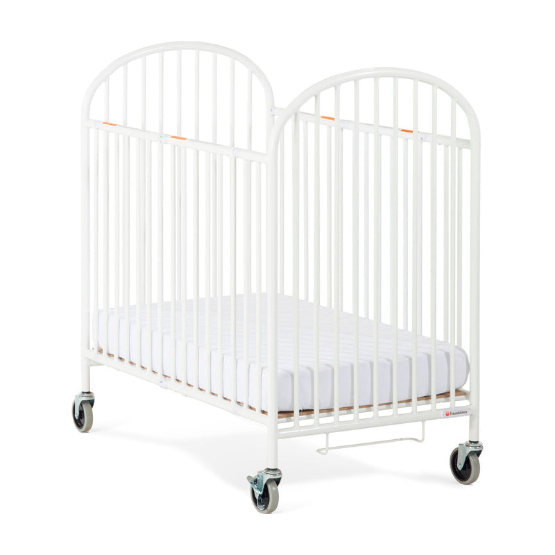 Foundations Pinnacle Compact Folding Steel Crib with Oversized Casters and Foam Mattress