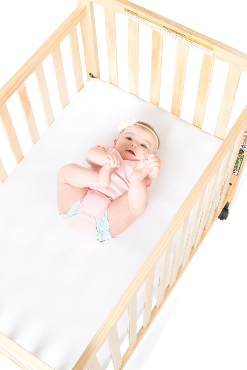 Foundations Safetycraft Fixed-Side Child Care Crib with Adjustable Mattress Board - Slatted-Natural