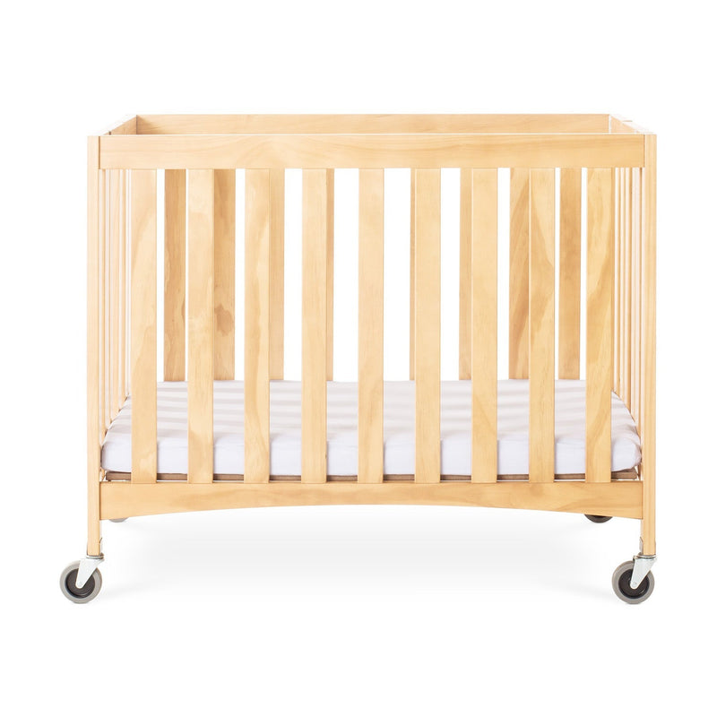 Foundations Travel Sleeper Compact Folding Wood Crib with 2" Foam Mattress and Oversized Casters - Natural